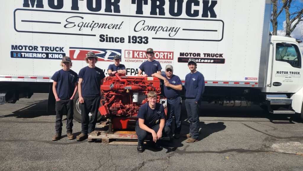 Kenworth of Pennsylvania visits the Berks Career & Technology Center (BCTC) to donate a Cummins X15 engine core to its diesel technology program.